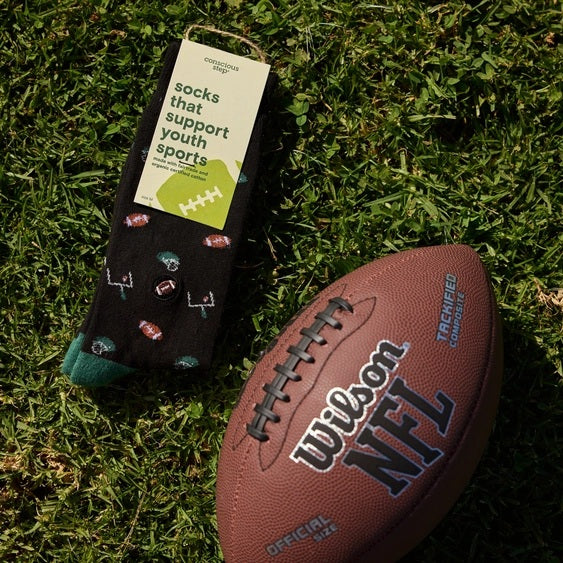 Socks that Support Youth Sports (Black Footballs)