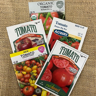 https://ellingtonagway.com/cdn/shop/products/TomatoSeeds_grande.jpg?v=1643552900